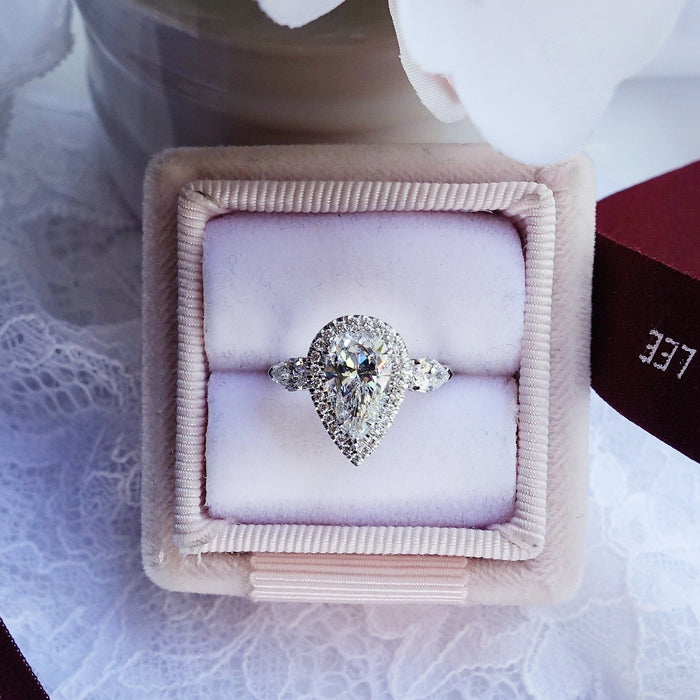 Pear Shape Halo Three Stone Diamond Engagement Ring